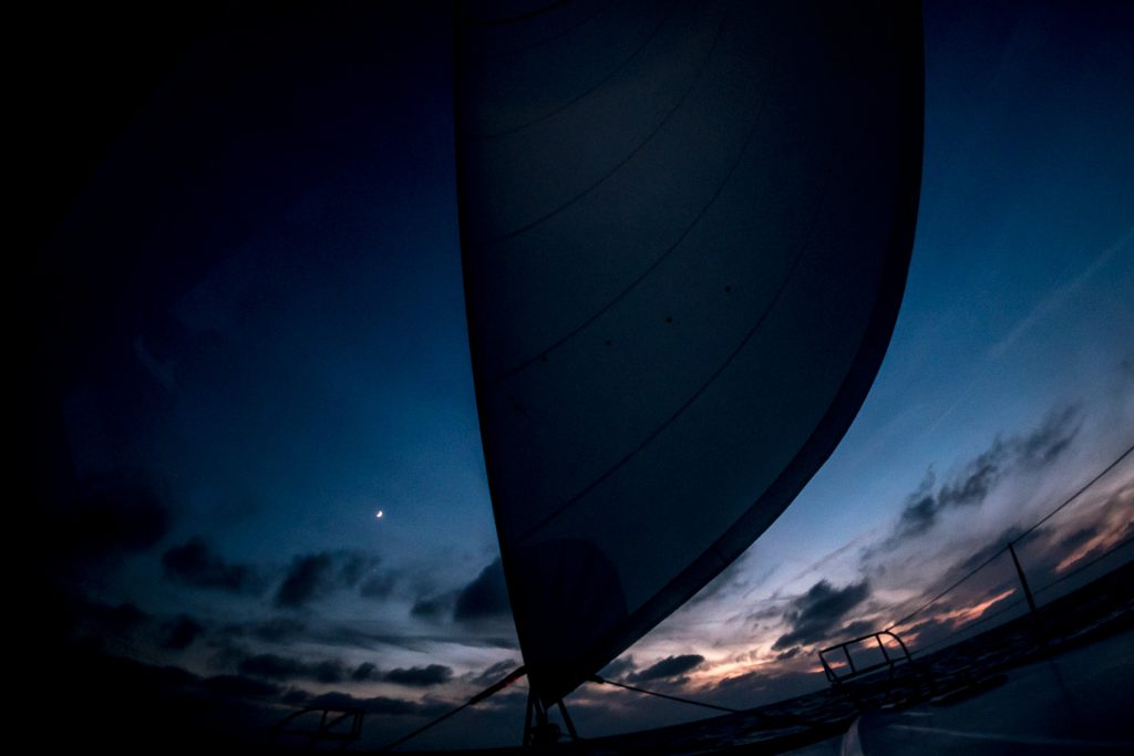 Moon setting on the bow